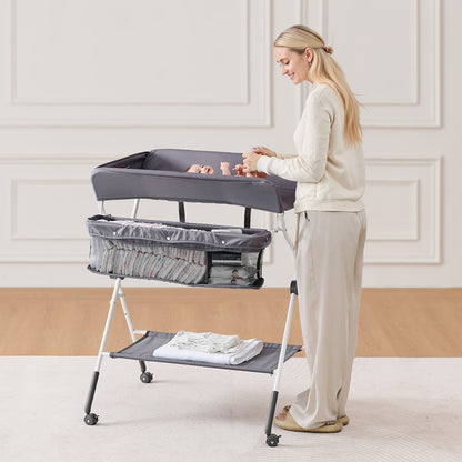 Wickeltisch, faltbar mit Seitenkorb, höhenverstellbar, tragbar, mit feststellbaren Rollen, multifunktionaler Aufbewahrungsorganizer fürs Kinderzimmer, Dunkelgrau